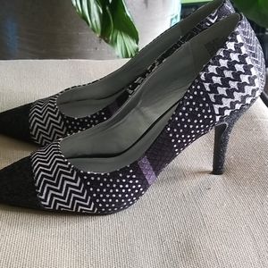 Black and white closed toe pumps